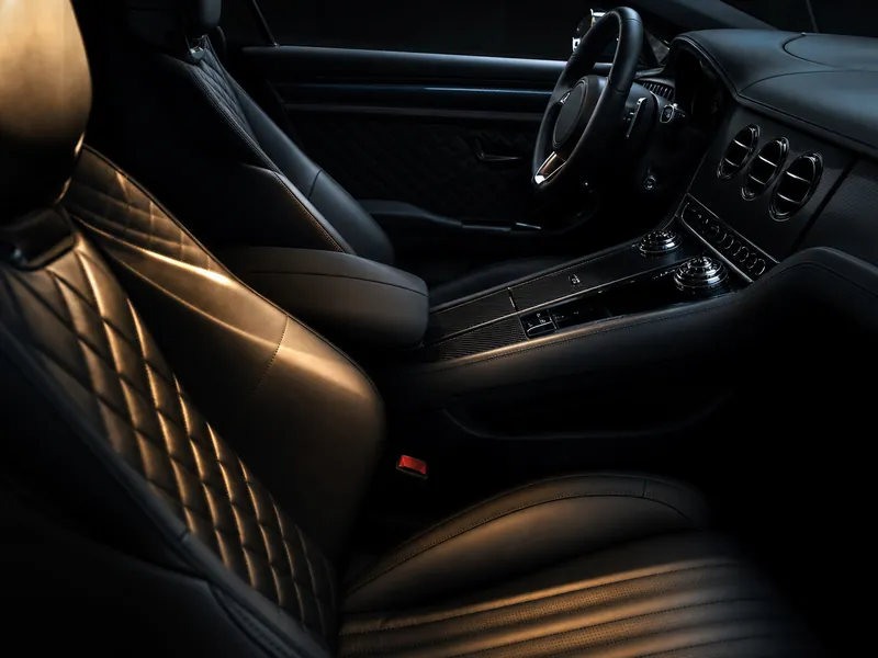 Freshly detailed quilted black leather seats and carbon fibre trim
